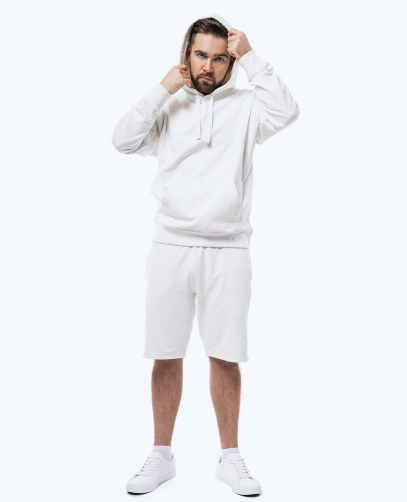 man wearing white classic pure organic cotton shorts