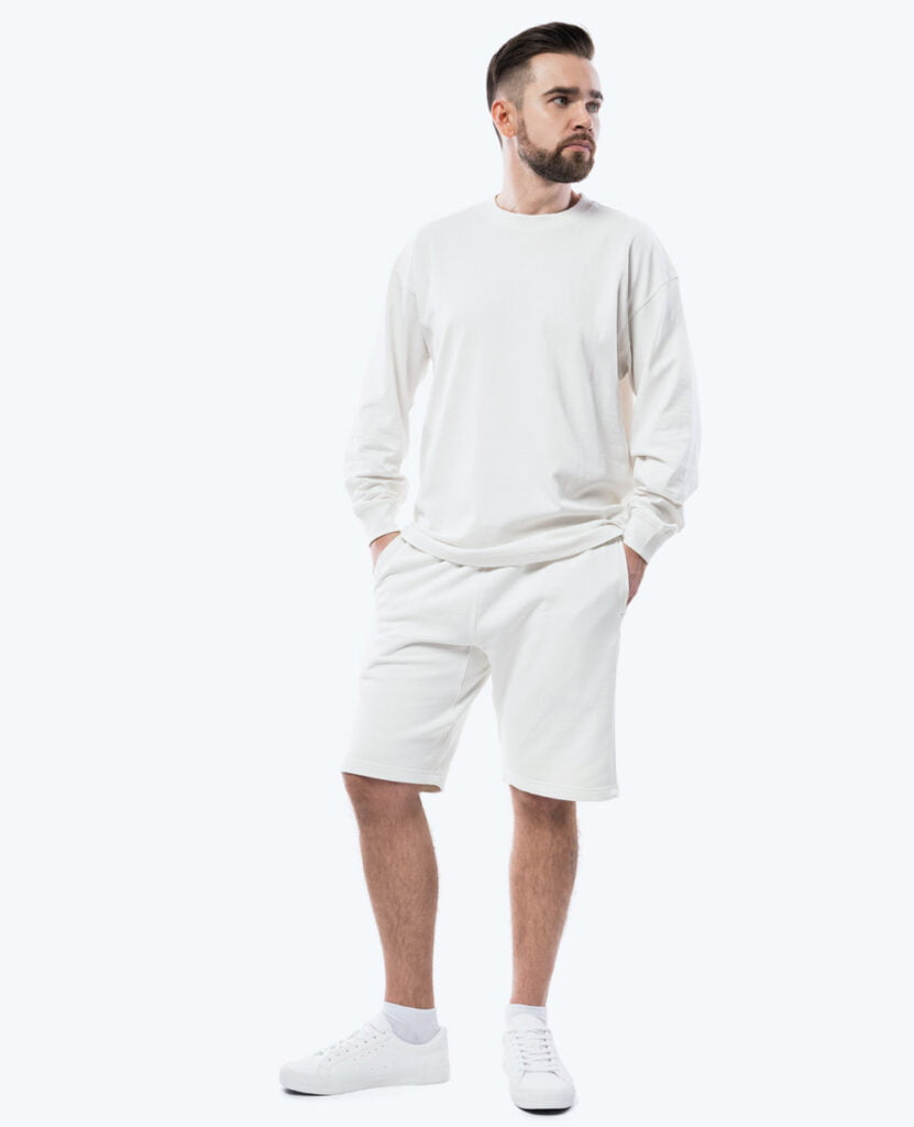 man wearing white classic french terry cotton shorts