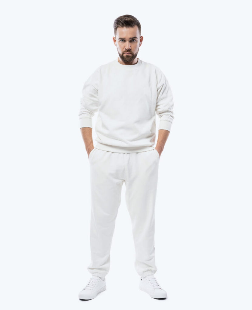 man wearing white french terry pure organic cotton joggers