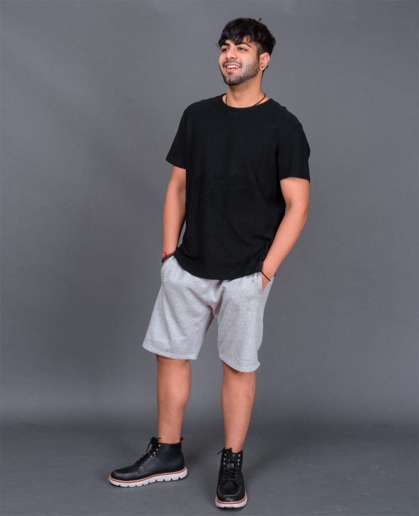 man wearing grey french terry shorts